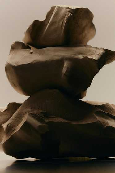 Woman in workout clothes on a blue exercise surface